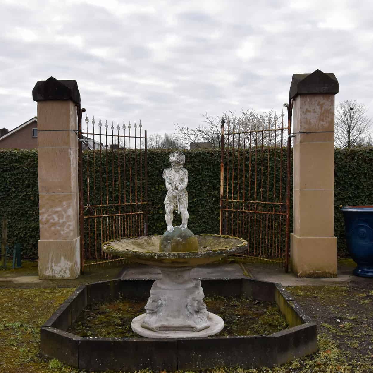 Zandstenen-poortpalen